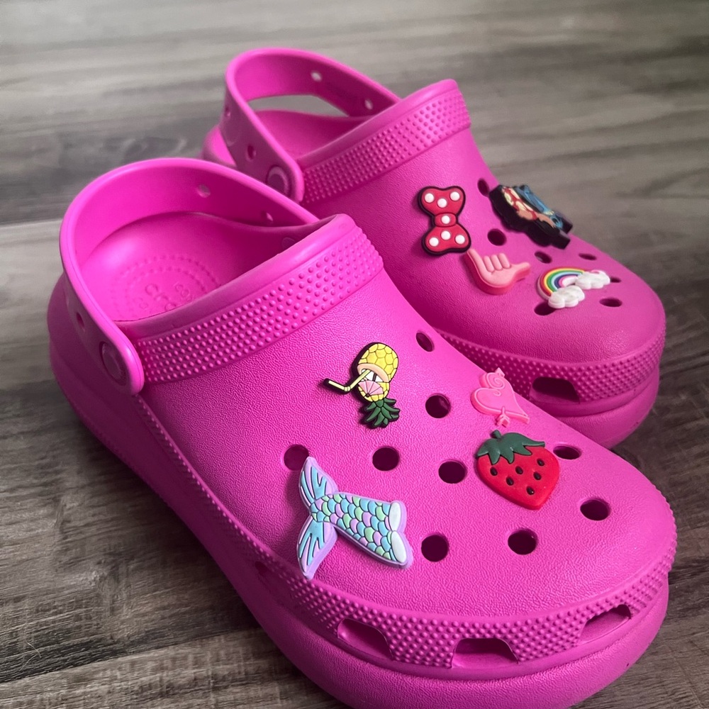 Pink platform crocs with Charms